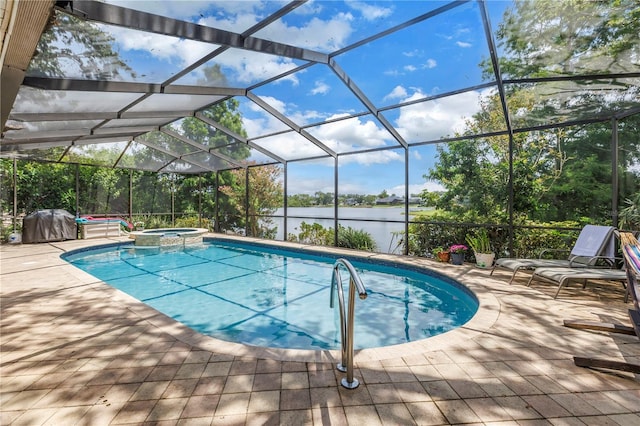 8127 Siquita Dr NE, Saint Petersburg, FL 33702 - view of pool with a water view, a patio, a pool with connected hot tub, and glass enclosure