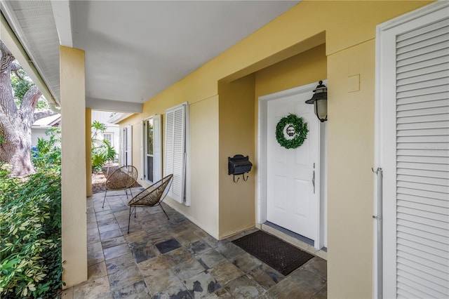 8127 Siquita Dr NE, Saint Petersburg, FL 33702 - entrance to property featuring stucco siding