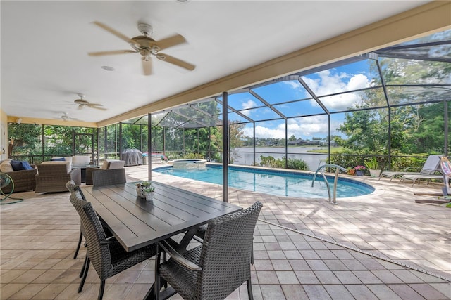 8127 Siquita Dr NE, Saint Petersburg, FL 33702 - view of swimming pool with a patio, a ceiling fan, a pool with connected hot tub, and glass enclosure