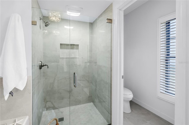 8127 Siquita Dr NE, Saint Petersburg, FL 33702 - full bathroom featuring toilet, a stall shower, plenty of natural light, and baseboards