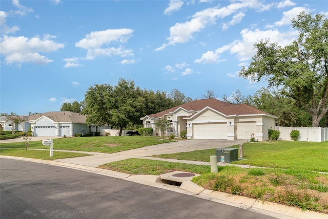 14266 Creek Run Dr, Riverview, FL 33579 - ranch-style home featuring a garage, concrete driveway, stucco siding, and a residential view