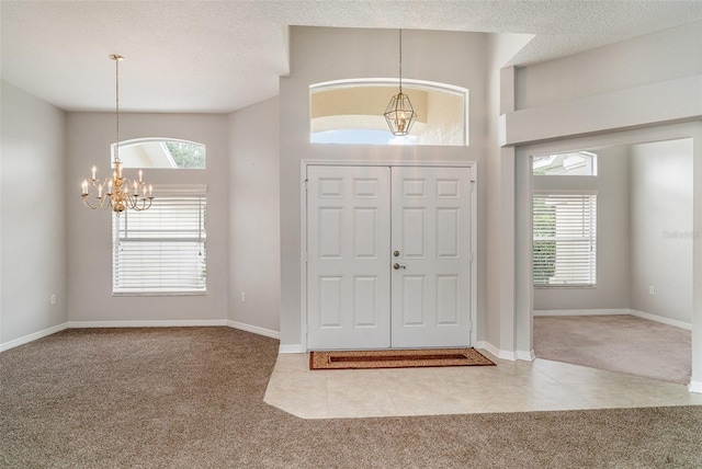 14266 Creek Run Dr, Riverview, FL 33579 - carpeted foyer featuring a chandelier and baseboards