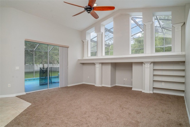 14266 Creek Run Dr, Riverview, FL 33579 - unfurnished living room featuring vaulted ceiling, carpet floors, a ceiling fan, plenty of natural light, and baseboards