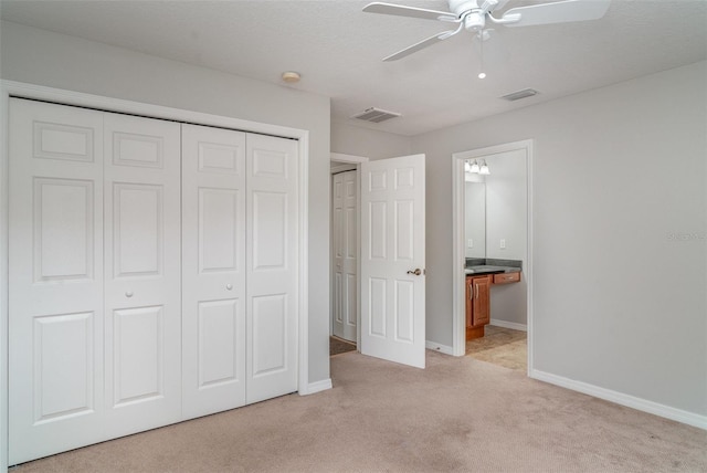 14266 Creek Run Dr, Riverview, FL 33579 - unfurnished bedroom with light colored carpet, a closet, baseboards, and connected bathroom