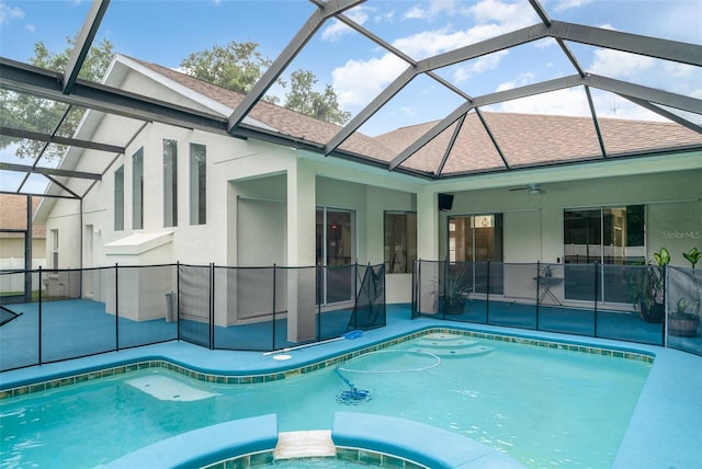 14266 Creek Run Dr, Riverview, FL 33579 - view of swimming pool featuring a pool with connected hot tub, a patio area, and glass enclosure