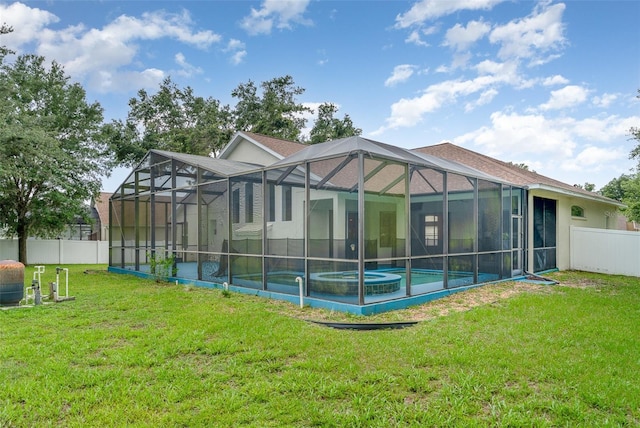 14266 Creek Run Dr, Riverview, FL 33579 - back of property with a pool with connected hot tub, a lanai, and stucco siding