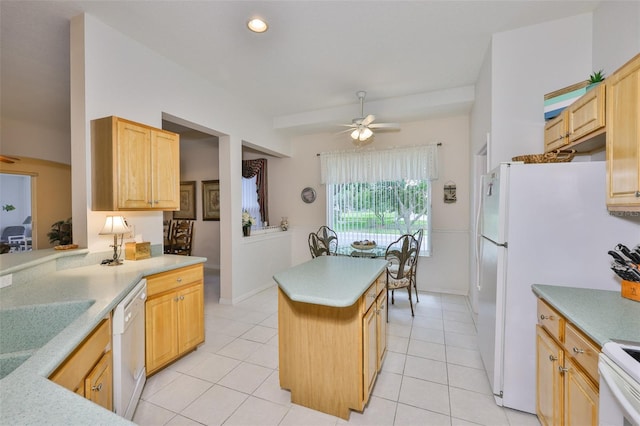 2128 Worthington Greens Dr, Sun City Center, FL 33573 - kitchen with white appliances, ceiling fan, light tile patterned flooring, light countertops, and recessed lighting