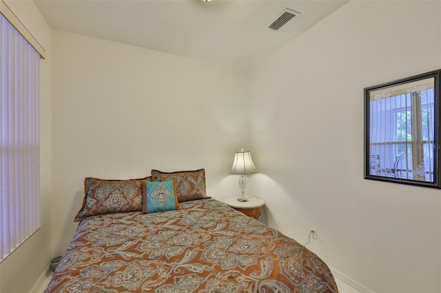 2128 Worthington Greens Dr, Sun City Center, FL 33573 - bedroom featuring baseboards