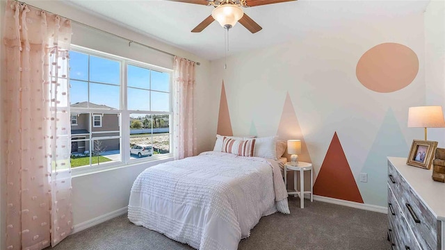 1704 Tahitian Sunrise Dr, Plant City, FL 33565 - bedroom featuring carpet, baseboards, and a ceiling fan