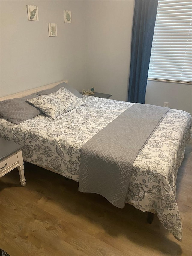 12619 Richezza Dr, Venice, FL 34293 - bedroom with dark wood-type flooring