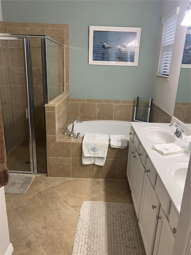 12619 Richezza Dr, Venice, FL 34293 - bathroom with a stall shower, a garden tub, tile patterned floors, and double vanity