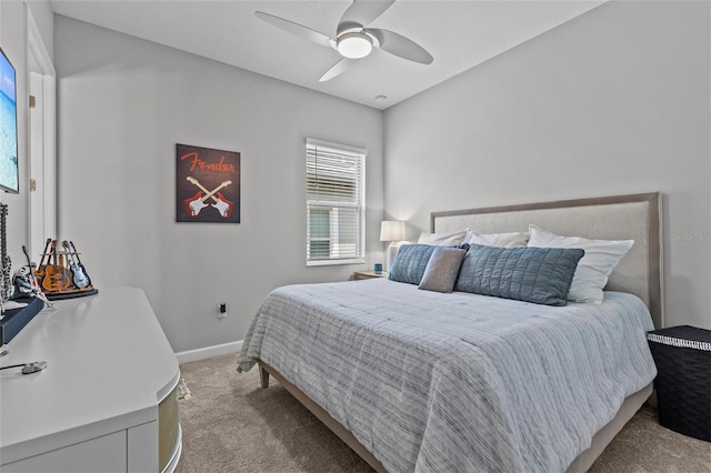 31921 Magna Gulf Loop, San Antonio, FL 33576 - carpeted bedroom with baseboards and ceiling fan