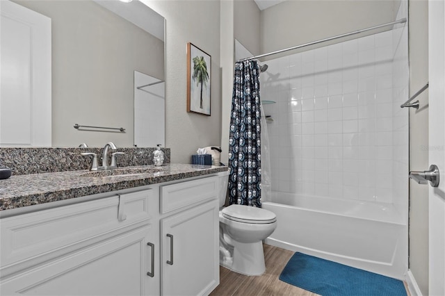 31921 Magna Gulf Loop, San Antonio, FL 33576 - full bath featuring toilet, vanity, wood finished floors, and shower / tub combo with curtain