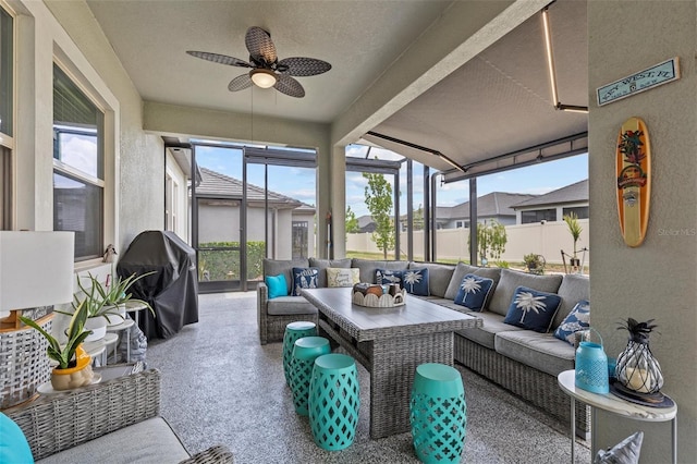 31921 Magna Gulf Loop, San Antonio, FL 33576 - sunroom / solarium featuring an outdoor hangout area, a ceiling fan, and beam ceiling