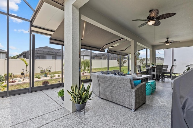 31921 Magna Gulf Loop, San Antonio, FL 33576 - sunroom featuring outdoor dining area, an outdoor living space, and ceiling fan