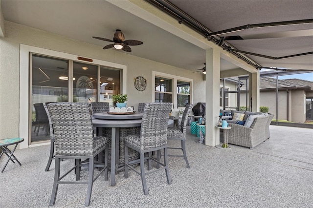 31921 Magna Gulf Loop, San Antonio, FL 33576 - view of patio / terrace featuring an outdoor living space, ceiling fan, and outdoor dining space