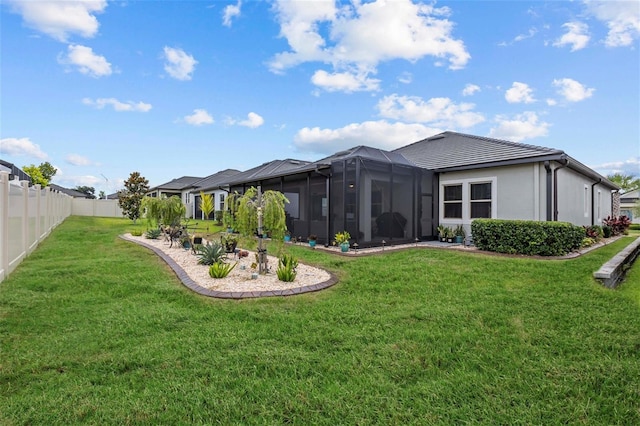 31921 Magna Gulf Loop, San Antonio, FL 33576 - rear view of house with a lanai and a tile roof