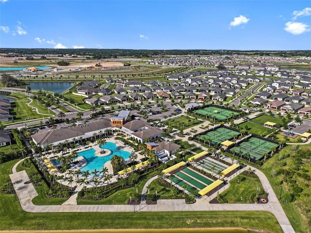 31921 Magna Gulf Loop, San Antonio, FL 33576 - aerial overview of property's location featuring a large body of water, a pool, and nearby suburban area
