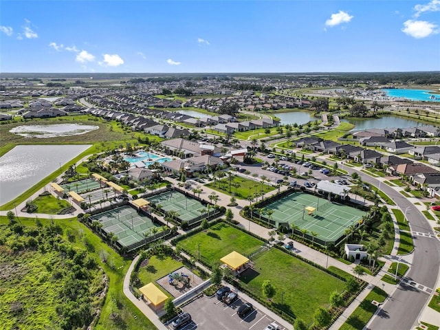31921 Magna Gulf Loop, San Antonio, FL 33576 - aerial perspective of suburban area with a nearby body of water