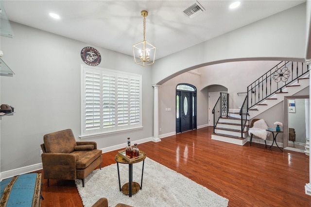 2011 Water Wheel Ct, Dunedin, FL 34698 - entrance foyer featuring arched walkways, stairway, wood finished floors, recessed lighting, and baseboards