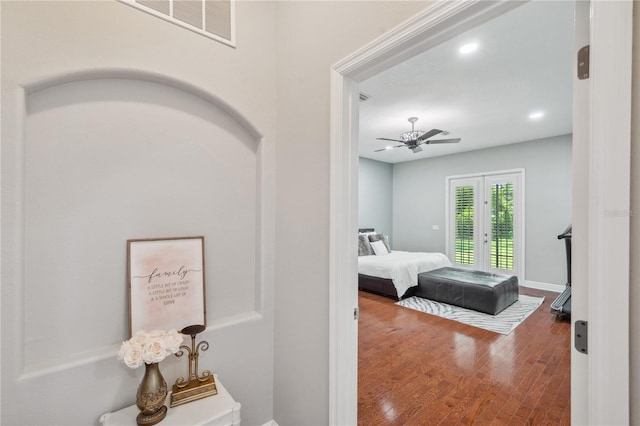 2011 Water Wheel Ct, Dunedin, FL 34698 - bedroom featuring access to outside, wood finished floors, a ceiling fan, recessed lighting, and baseboards