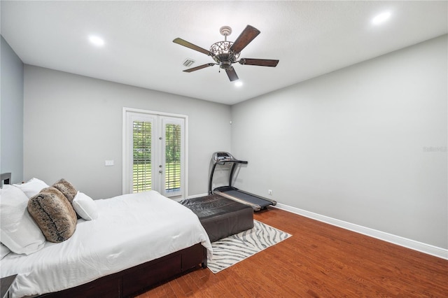 2011 Water Wheel Ct, Dunedin, FL 34698 - bedroom with access to exterior, wood finished floors, recessed lighting, a ceiling fan, and baseboards