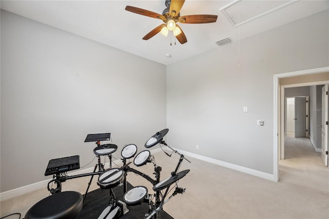2011 Water Wheel Ct, Dunedin, FL 34698 - workout room featuring attic access, light carpet, a ceiling fan, and baseboards