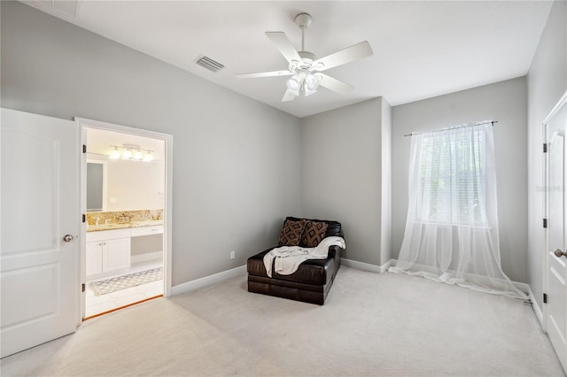 2011 Water Wheel Ct, Dunedin, FL 34698 - sitting room with light colored carpet, ceiling fan, and baseboards