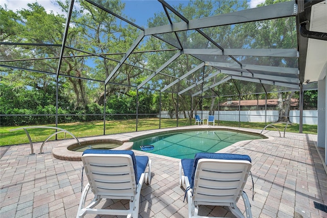 2011 Water Wheel Ct, Dunedin, FL 34698 - view of swimming pool featuring an in-ground hot tub, a patio, a lanai, and view of wooded area
