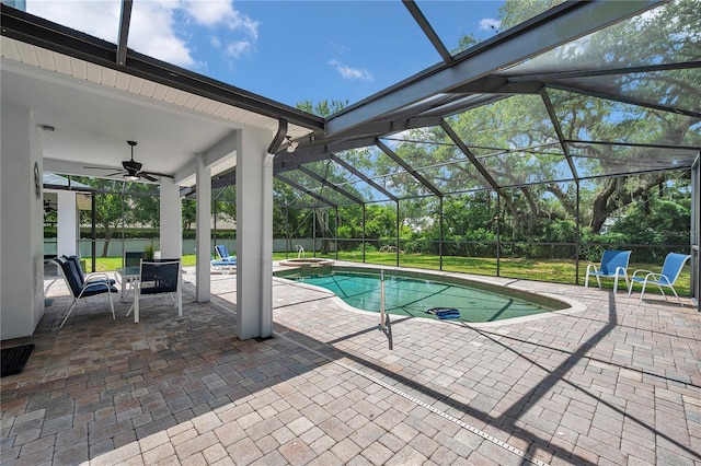 2011 Water Wheel Ct, Dunedin, FL 34698 - view of pool with a patio, ceiling fan, a pool with connected hot tub, and a fenced backyard