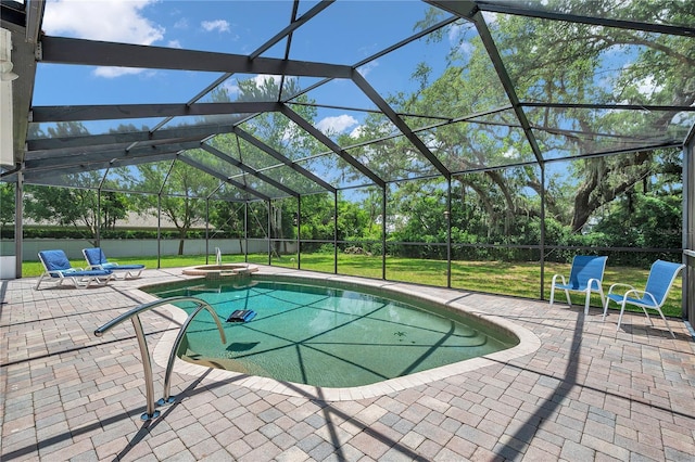 2011 Water Wheel Ct, Dunedin, FL 34698 - view of pool with a patio, a pool with connected hot tub, and a lanai