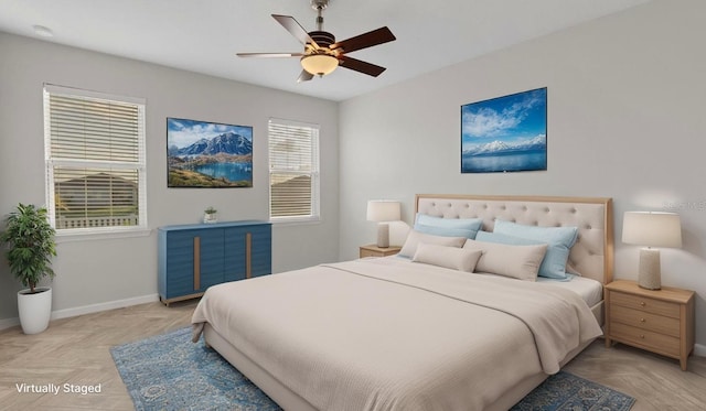 6211 114th Dr E, Parrish, FL 34219 - bedroom with baseboards and ceiling fan