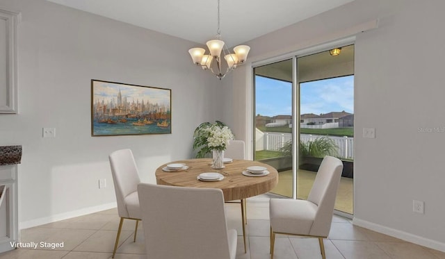 6211 114th Dr E, Parrish, FL 34219 - dining room with a chandelier, light tile patterned flooring, baseboards, and a water view
