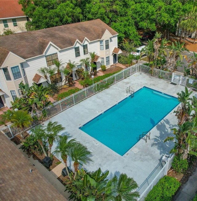 2302 Maki Rd Unit 69, Plant City, FL 33563 - community pool featuring a fenced backyard
