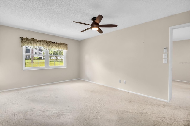 860 Maclaren Dr N Unit A, Palm Harbor, FL 34684 - unfurnished room featuring ceiling fan, carpet flooring, baseboards, and a textured ceiling