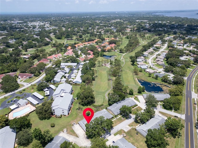 860 Maclaren Dr N Unit A, Palm Harbor, FL 34684 - aerial view of property's location with a nearby body of water, nearby suburban area, and a golf club