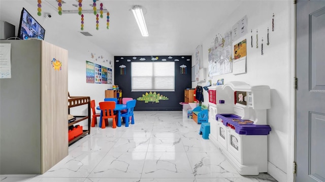 12416 Queensland Ln, Tampa, FL 33625 - game room featuring marble finish flooring