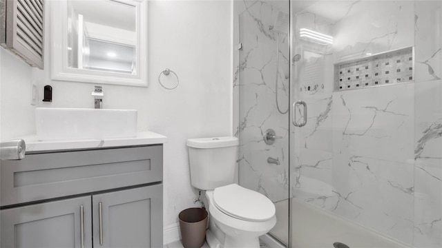 12416 Queensland Ln, Tampa, FL 33625 - bathroom with a marble finish shower, vanity, and toilet