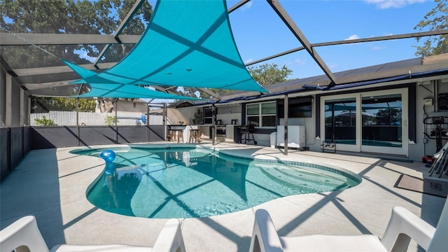 12416 Queensland Ln, Tampa, FL 33625 - view of pool with a patio area and glass enclosure