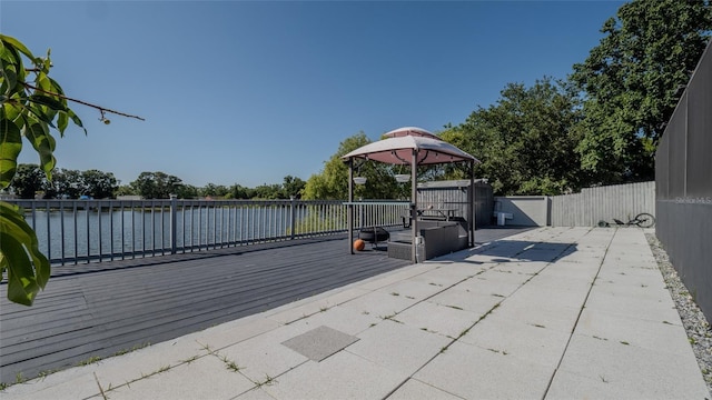 12416 Queensland Ln, Tampa, FL 33625 - view of patio with a gazebo and a deck with water view