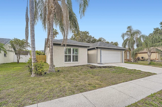 3058 Cara Ct, Palm Harbor, FL 34684 - view of front of house featuring driveway, an attached garage, brick siding, and a shingled roof
