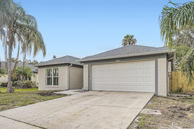 3058 Cara Ct, Palm Harbor, FL 34684 - ranch-style home featuring brick siding, driveway, a garage, and roof with shingles