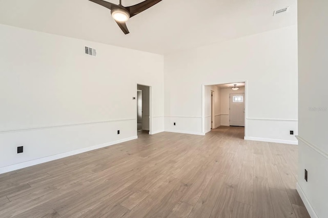 3058 Cara Ct, Palm Harbor, FL 34684 - unfurnished room featuring light wood finished floors, a ceiling fan, and baseboards