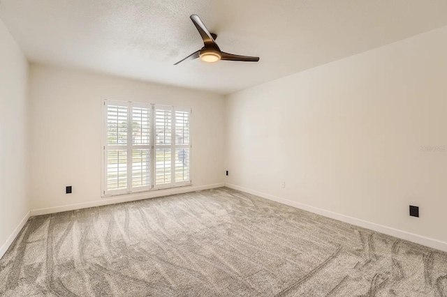 3058 Cara Ct, Palm Harbor, FL 34684 - unfurnished room featuring ceiling fan, carpet flooring, and baseboards