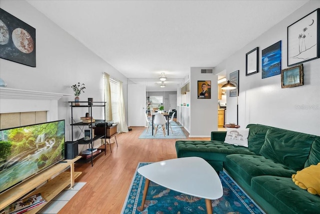 4004 Dream Oak Pl Unit 102, Tampa, FL 33613 - living room with light wood-style floors and a ceiling fan