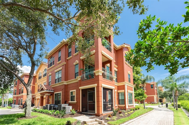 2741 Via Cipriani Unit 934B, Clearwater, FL 33764 - view of building exterior with central air condition unit