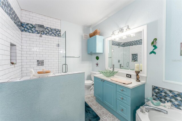 2741 Via Cipriani Unit 934B, Clearwater, FL 33764 - bathroom featuring a stall shower, vanity, toilet, a bath, and tile patterned floors