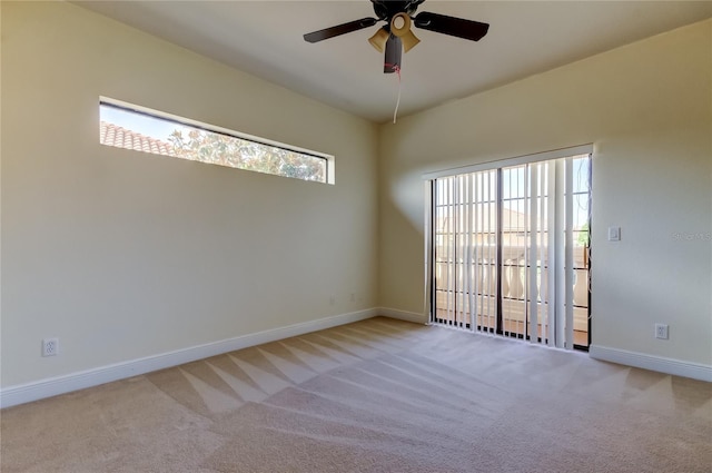 1531 Ember Ln, Tarpon Springs, FL 34689 - carpeted spare room with baseboards and ceiling fan