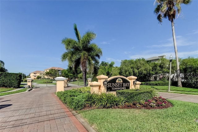 1531 Ember Ln, Tarpon Springs, FL 34689 - community sign with a lawn