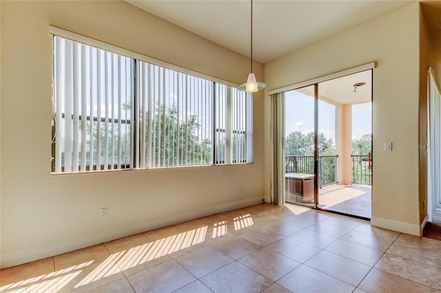 1531 Ember Ln, Tarpon Springs, FL 34689 - unfurnished dining area featuring baseboards and tile patterned floors